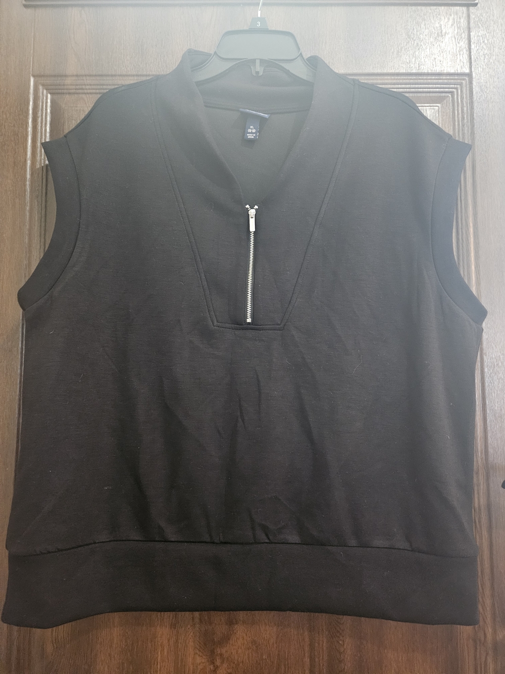 Sleeveless Black Zip-Front Top